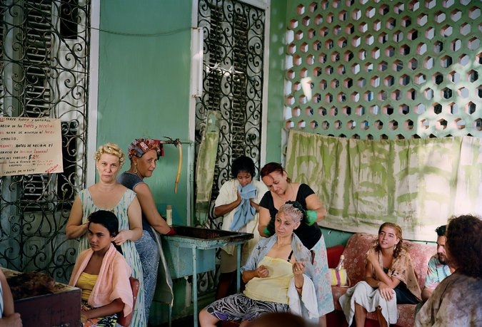 “Beauty Salon in Vedado Neighborhood, Havana, 1993,” Tria Giovan, FROM THE EXHIBITION CUBAIS AT THE ANNENBERG SPACE FOR PHOTOGRAPHY. VIA THE NEW YORK TIMES